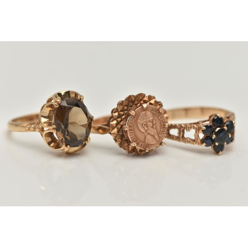 58 - THREE 9CT GOLD RINGS, the first an oval cut smoky quartz ring, measuring approximately 11.4mm x 9.1m... 