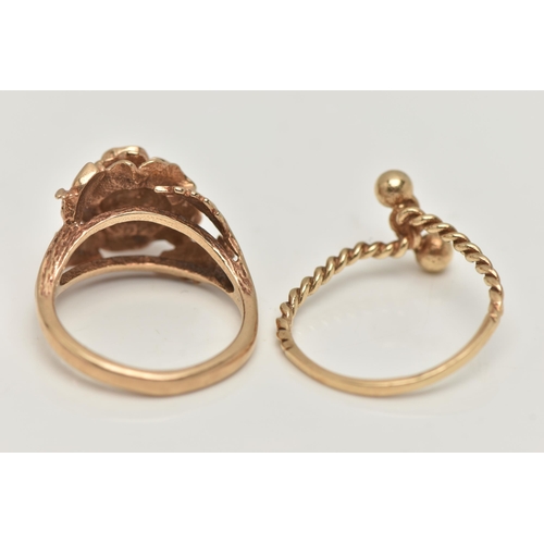 61 - TWO YELLOW METAL RINGS, the first in the form of a textured rose, bifurcated shoulders leading onto ... 