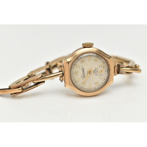 73 - A LADIES 9CT GOLD CASED WRISTWATCH, manual wind, round silver dial signed 'Everite', alternating Ara... 