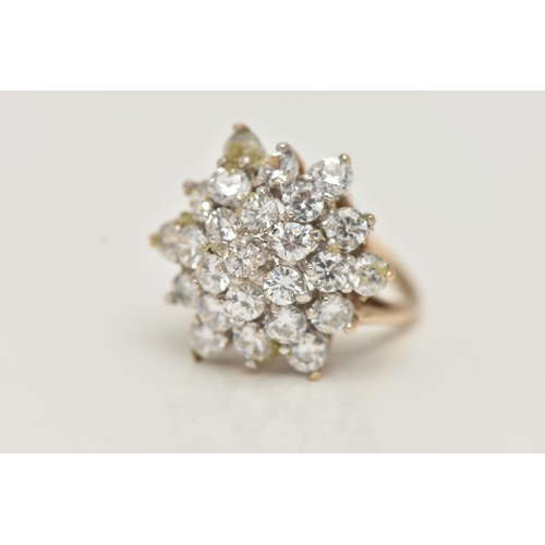 8 - A 9CT GOLD CUBIC ZIRCONIA CLUSTER RING, designed as four tiers of claw set, circular colourless cubi... 