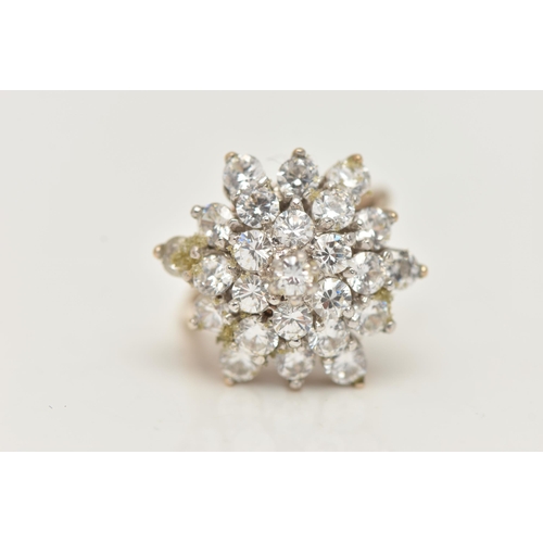 8 - A 9CT GOLD CUBIC ZIRCONIA CLUSTER RING, designed as four tiers of claw set, circular colourless cubi... 