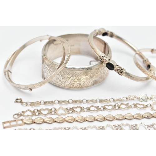 104 - ASSORTED SILVER AND WHITE METAL BRACELETS, to include a wide silver hinged bangle, etched with flora... 