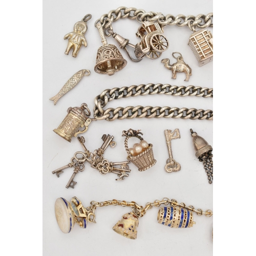 105 - A SILVER CHARM BRACELET AND CHARMS, a curb link bracelet fitted with a spring clasp and heart padloc... 