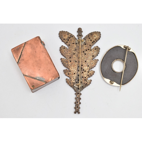 107 - A CUT STEEL BROOCH, SCOTTISH BROOCH AND BRASS BOOK LIGHTER, a foliage design cut steel brooch, fitte... 