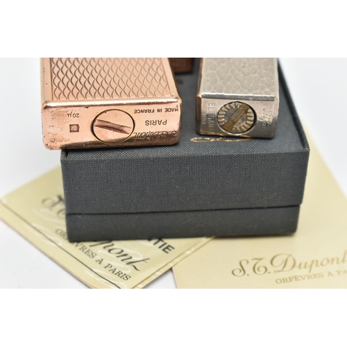 109 - TWO LIGHTERS, to include a boxed gold plated 'S.T.Dupont' engine turned pattern lighter, signed to t... 