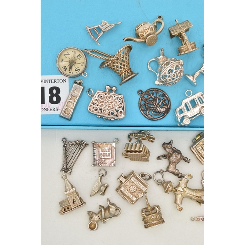 118 - ASSORTED SILVER AND WHITE METAL CHARMS, to include a silver ingot, hallmarked Birmingham, approximat... 