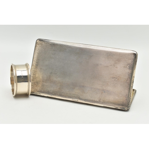 123 - TWO SILVER ITEMS, to include a rectangular form cigarette case, engine turned pattern, gilt interior... 