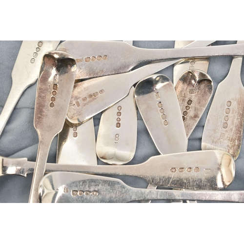 135 - A MATCHED SET OF TWELVE GEORGE IV TO VICTORIAN SILVER FIDDLE PATTERN TABLESPOONS, including a pair b... 