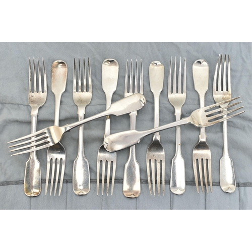 136 - A MATCHED SET OF ELEVEN GEORGE IV TO VICTORIAN SILVER FIDDLE PATTERN TABLE FORKS, including a set of... 