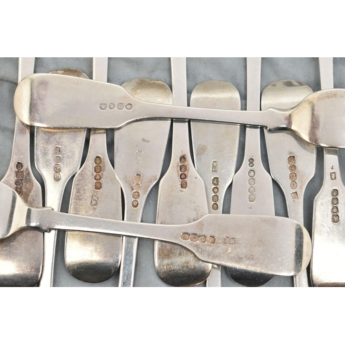 136 - A MATCHED SET OF ELEVEN GEORGE IV TO VICTORIAN SILVER FIDDLE PATTERN TABLE FORKS, including a set of... 