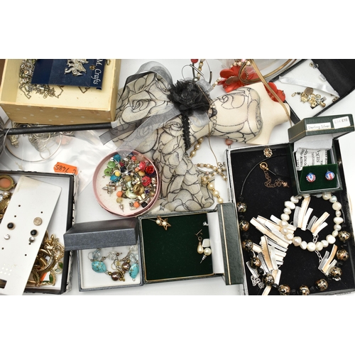 145 - A SELECTION OF JEWELLERY, to include a small assortment of white metal jewellery, including a bangle... 