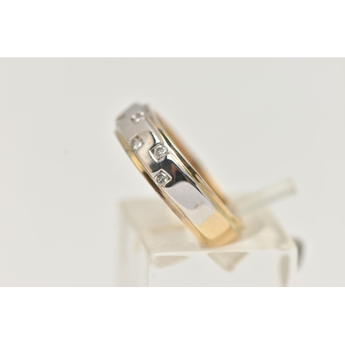 79 - AN 18CT GOLD BI COLOUR DIAMOND RING, a yellow gold band ring with white gold to the centre top of th... 