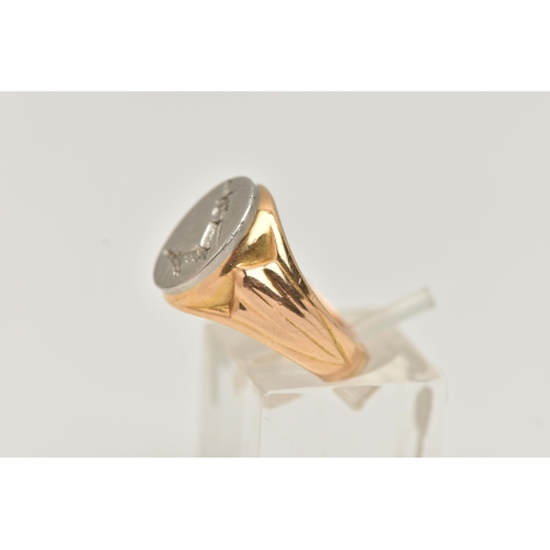 81 - AN 18CT GOLD BI COLOUR SIGNET RING, designed as a white gold oval face with etched crest, depicting ... 