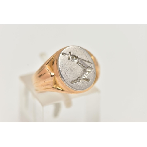 81 - AN 18CT GOLD BI COLOUR SIGNET RING, designed as a white gold oval face with etched crest, depicting ... 