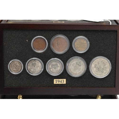 160 - A SMALL WOODEN COIN CABINET, consisting of eight drawers seven containing UK coinage from 1939-1945,... 