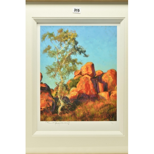 315 - ROLF HARRIS (AUSTRALIAN 1930-2023) 'SINGLE GUM TREE AND DEVIL'S MARBLES', a limited edition print on... 