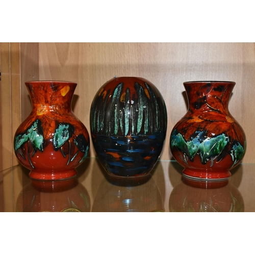 333 - THREE ANITA HARRIS ART POTTERY VASES, two florally decorated baluster vases, with printed backstamps... 