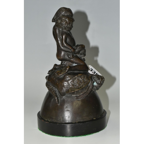 335 - A BRONZE FIGURE GROUP, depicting a mother and child kneeling on top of a mythical beast, loose on a ... 