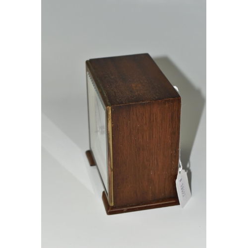 336 - A SMALL ELLIOTT MANTEL CLOCK, the case square in form, raised on two tapering feet, the dial marked ... 