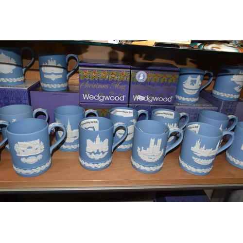 339 - FIFTEEN WEDGWOOD JASPERWARE CHRISTMAS MUGS, in pale blue, decorated with Royal Palaces and London la... 