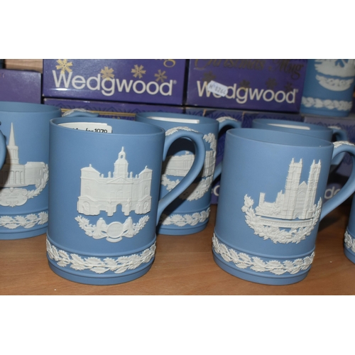 339 - FIFTEEN WEDGWOOD JASPERWARE CHRISTMAS MUGS, in pale blue, decorated with Royal Palaces and London la... 