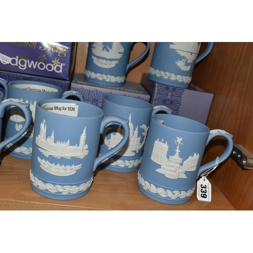 339 - FIFTEEN WEDGWOOD JASPERWARE CHRISTMAS MUGS, in pale blue, decorated with Royal Palaces and London la... 