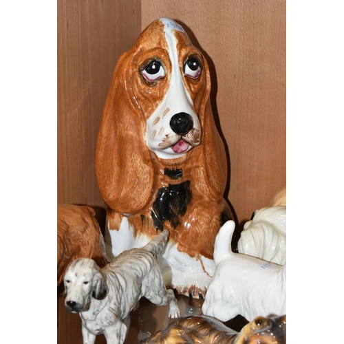 346 - A COLLECTION OF CERAMIC DOG FIGURES, twelve pieces to include a Royal Doulton English Setter RDA105,... 