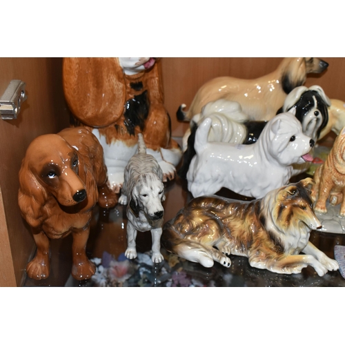 346 - A COLLECTION OF CERAMIC DOG FIGURES, twelve pieces to include a Royal Doulton English Setter RDA105,... 