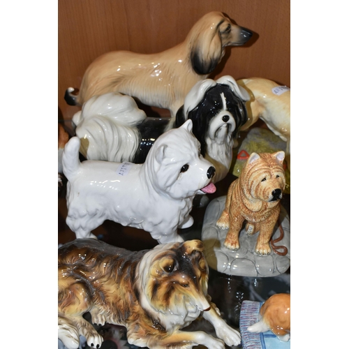 346 - A COLLECTION OF CERAMIC DOG FIGURES, twelve pieces to include a Royal Doulton English Setter RDA105,... 