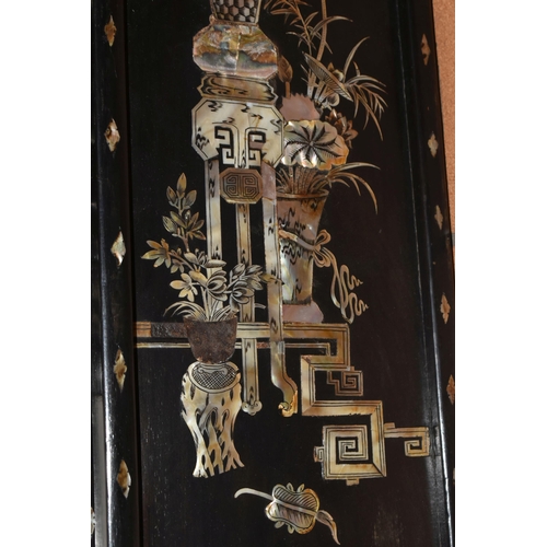 349 - A GROUP OF ORIENTAL TREEN, comprising three Chinese ebonised panels inlaid with mother of pearl, a s... 