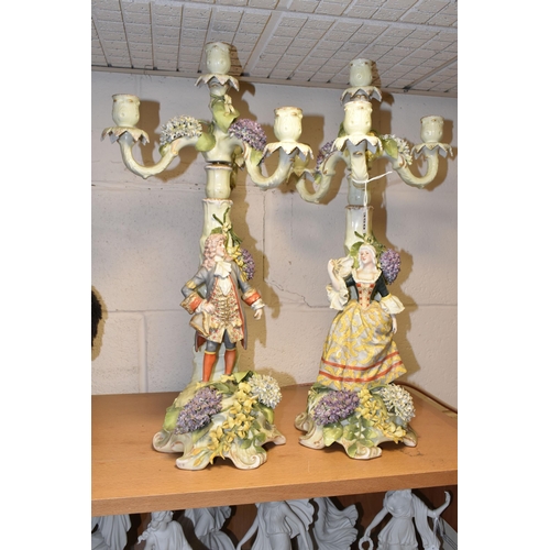 350 - A PAIR OF PLAUE FIGURAL CANDELABRA, the four sconce candelabra decorated with detailed modelled flow... 