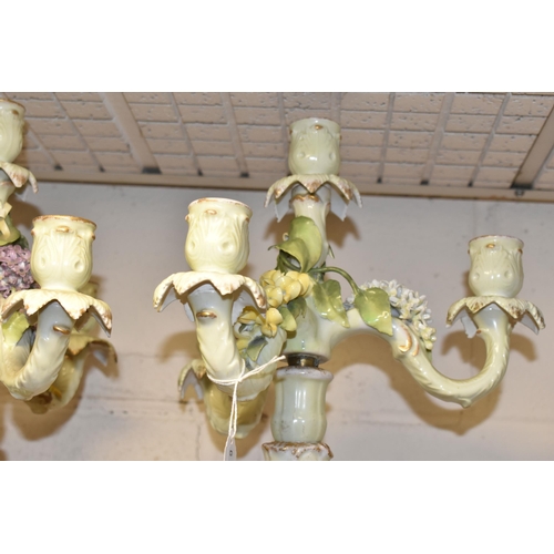 350 - A PAIR OF PLAUE FIGURAL CANDELABRA, the four sconce candelabra decorated with detailed modelled flow... 