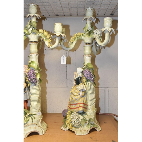 350 - A PAIR OF PLAUE FIGURAL CANDELABRA, the four sconce candelabra decorated with detailed modelled flow... 