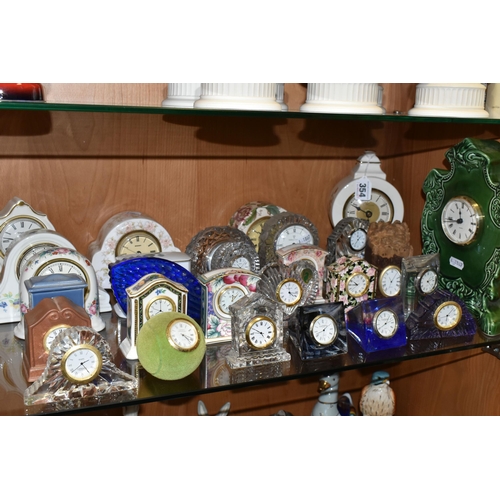 354 - TWENTY EIGHT ROYAL DOULTON, WATERFORD, CAITHNESS AND OTHER GIFTWARE QUARTZ CLOCKS, including Royal D... 