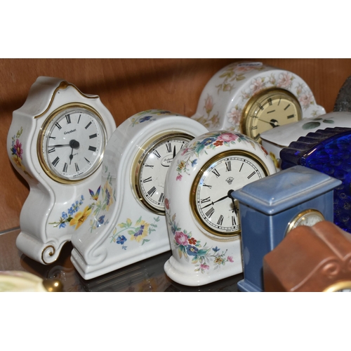 354 - TWENTY EIGHT ROYAL DOULTON, WATERFORD, CAITHNESS AND OTHER GIFTWARE QUARTZ CLOCKS, including Royal D... 