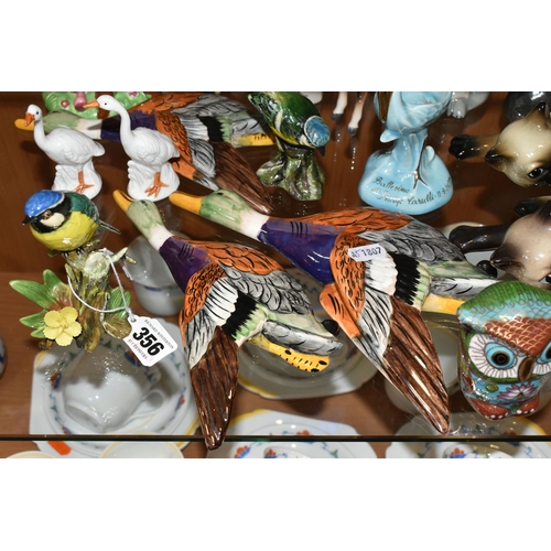 356 - A COLLECTION OF ANIMAL AND BIRD FIGURES, over twenty pieces, to include a Beswick lying down Siamese... 