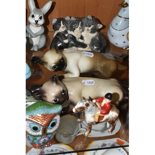 356 - A COLLECTION OF ANIMAL AND BIRD FIGURES, over twenty pieces, to include a Beswick lying down Siamese... 