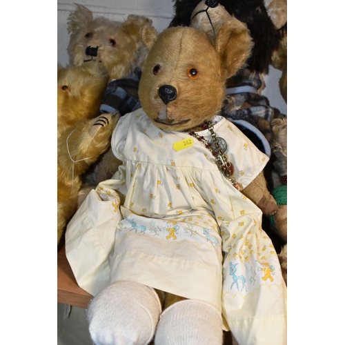 362 - SIX VINTAGE TEDDY BEARS, comprising a much loved straw filled jointed bear, glass eyes. stitched nos... 