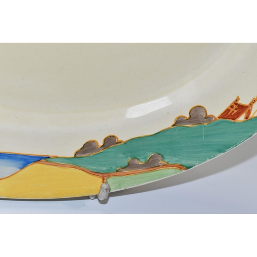 374 - A CLARICE CLIFF OVAL 'SECRETS' PATTERN MEAT PLATE, painted with a stylised tree and cottages in a la... 