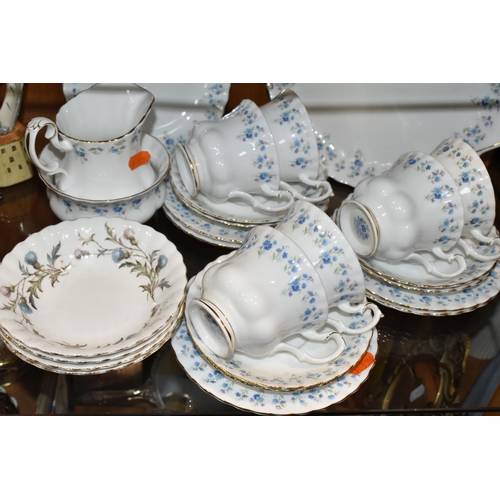 380 - A TWENTY ONE PIECE ROYAL ALBERT 'MEMORY LANE' TEA SET, comprising a cake plate, a cream jug, a sugar... 