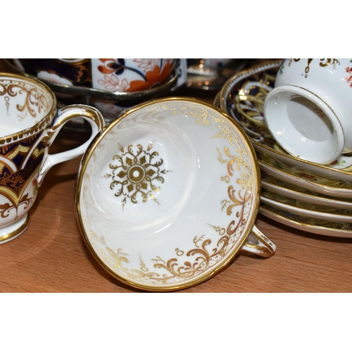 383 - A GROUP OF TEA WARE, comprising a hand painted part tea set: a cake plate, a slop bowl, five teacups... 