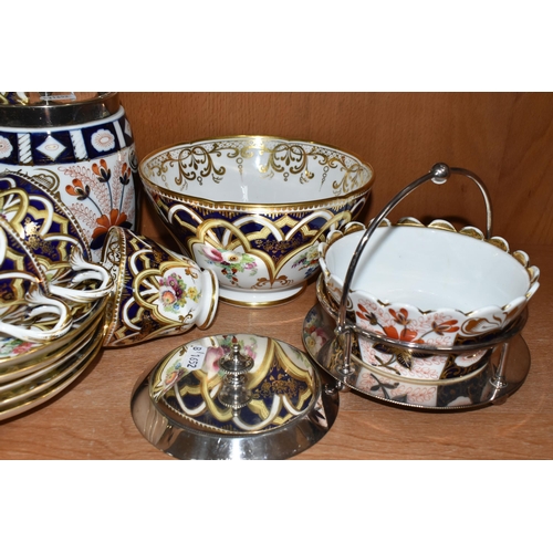 383 - A GROUP OF TEA WARE, comprising a hand painted part tea set: a cake plate, a slop bowl, five teacups... 