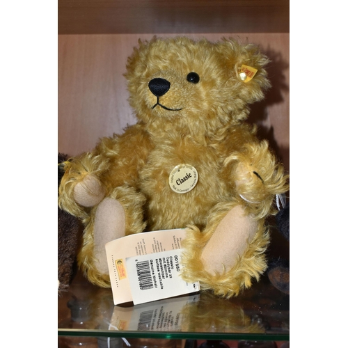 386 - FOUR STEIFF TEDDY BEARS, comprising Winnipeg Grizzly no 036637, jointed with black 'fur' and brown m... 