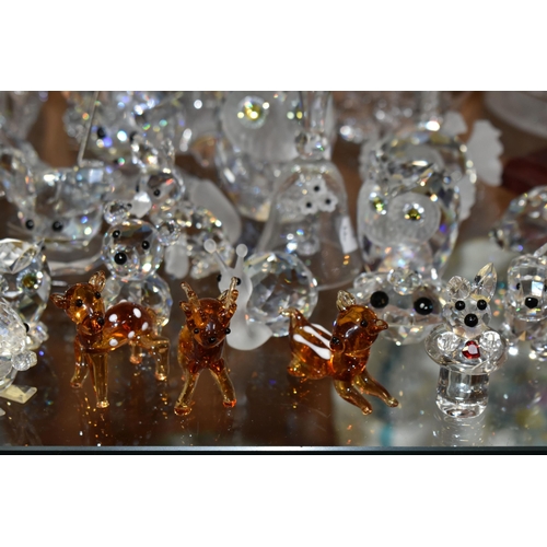 391 - A COLLECTION OF SWAROVSKI CRYSTAL AND OTHER DECORATIVE GLASS WARE, Swarovski figures to include owls... 