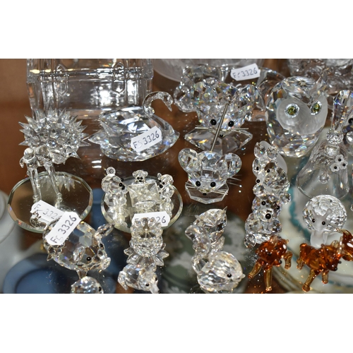 391 - A COLLECTION OF SWAROVSKI CRYSTAL AND OTHER DECORATIVE GLASS WARE, Swarovski figures to include owls... 