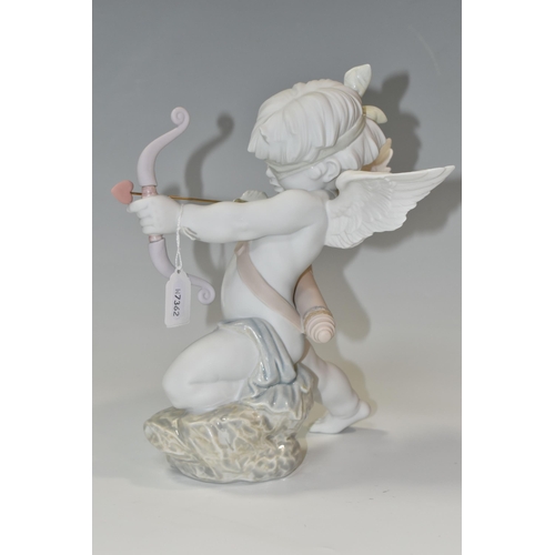 401 - A BOXED LLADRO 'STRAIGHT TO THE HEART' FIGURINE, a matte white porcelain with soft colours, model 92... 