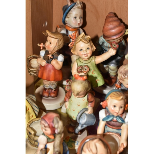 414 - A GROUP OF TWENTY SIX MID-CENTURY GOEBEL FIGURES, comprising 195 Barnyard Hero, 110 Lets Sing, 69 Ha... 