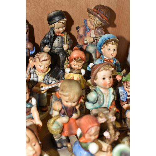 414 - A GROUP OF TWENTY SIX MID-CENTURY GOEBEL FIGURES, comprising 195 Barnyard Hero, 110 Lets Sing, 69 Ha... 