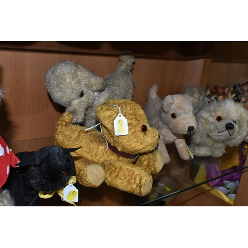 422 - A QUANTITY OF ASSORTED MID 20TH CENTURY SOFT TOY DOGS AND A CAT, one of the dogs has a Norah Welling... 