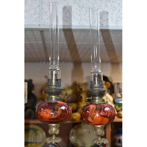 430 - A PAIR OF PHILIPE H. MOUREY OIL LAMPS CIRCA LATE 19TH CENTURY, each lamp has a central column formed... 